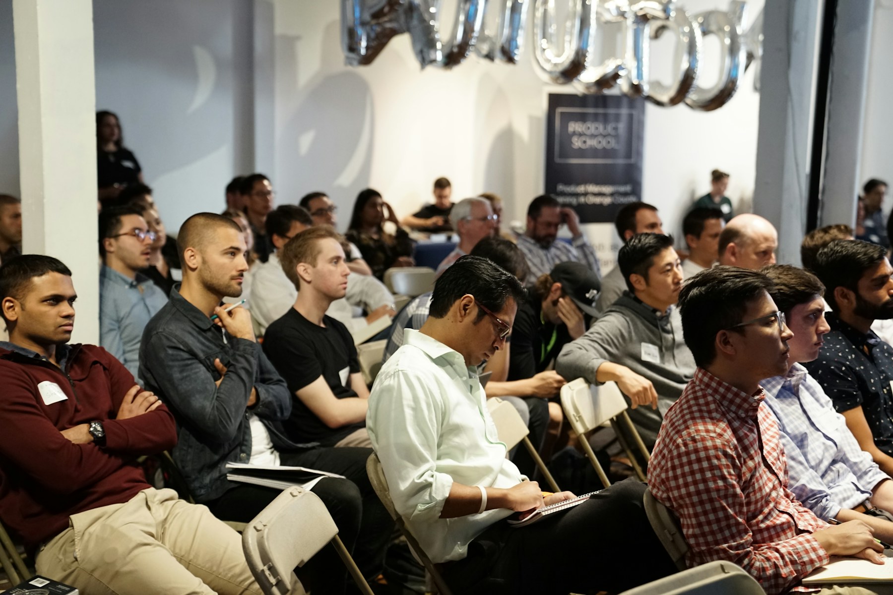Audience seated at a conference session
